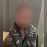 У Львові склали протокол на жінку, яка перекинула лампадки під виставкою з портретами загиблих військовополонених